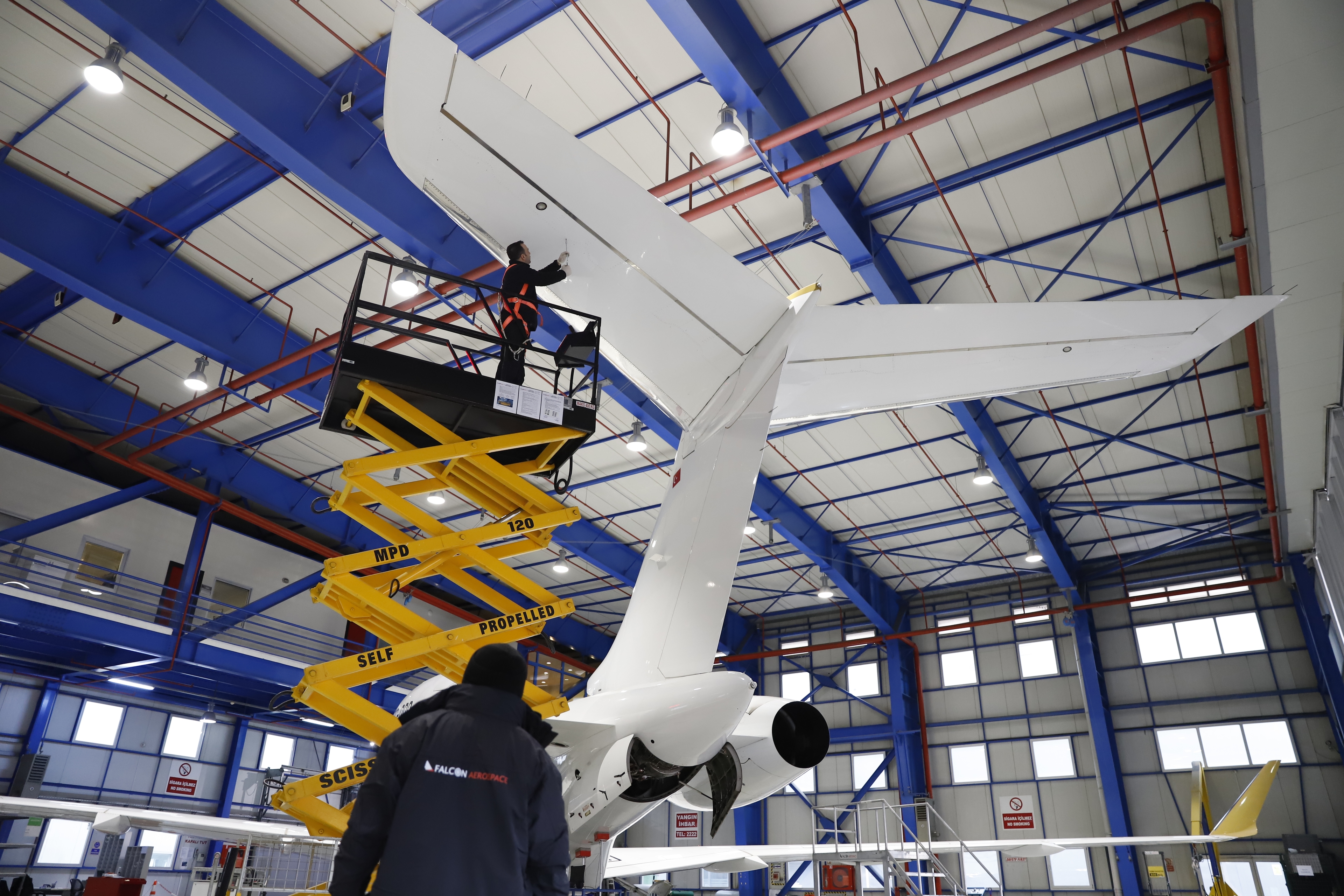 Falcon Aerospace technicians on the hangar floor
